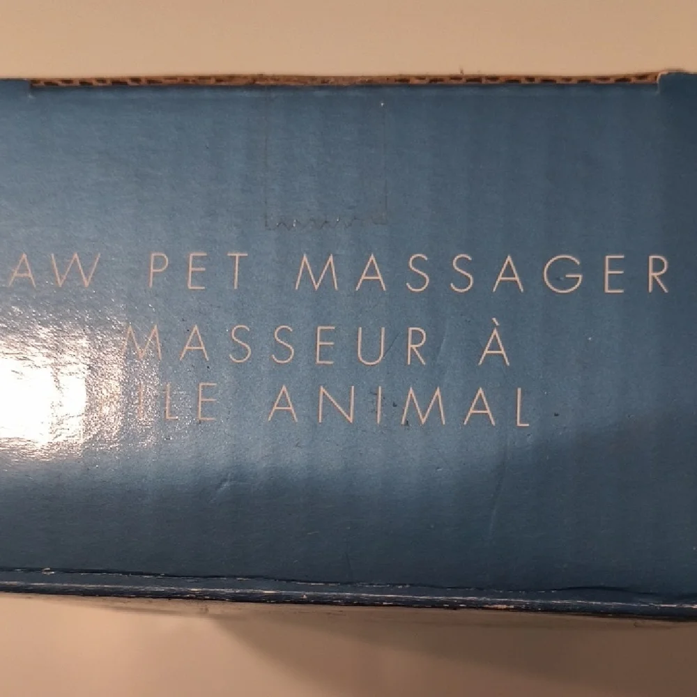 Paw Pet Massager. Quiet, safe and non threatening to pets.